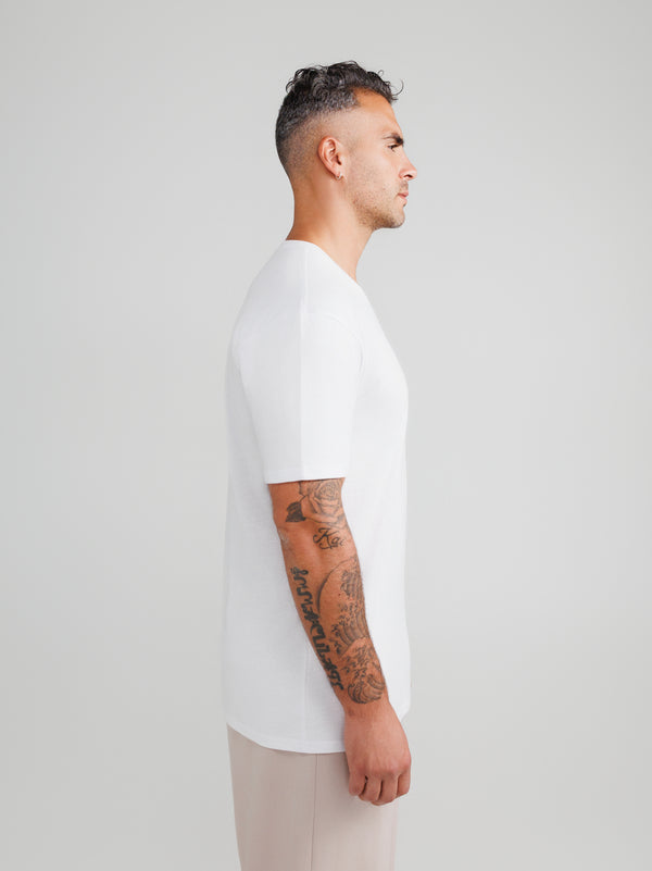 Camisetas blancas de cuello en V