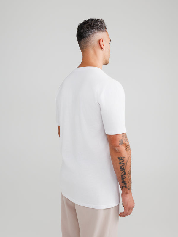 Camisetas blancas de cuello en V